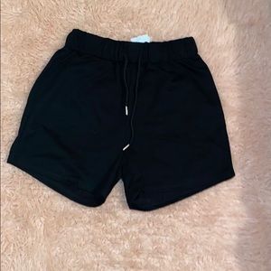 Two Pairs of ROMWE graphic shorts.